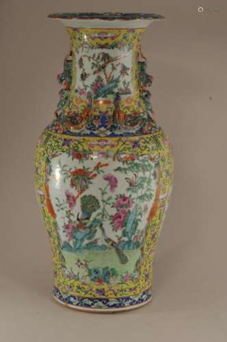 Large 19th century Chinese yellow ground baluster porcelain vase with Famille Rose decorated panels of birds, butterflies and flowers. Applied Chilong and foo lion handles. 18