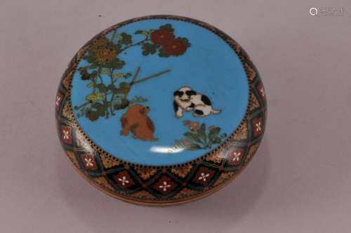 Incense box. Meiji period. (1868-1912). Cloisonne. Signed Namikawa Yasuyuki. Decoration of puppy dogs and flowers on a blue ground. Brocade borders. 3