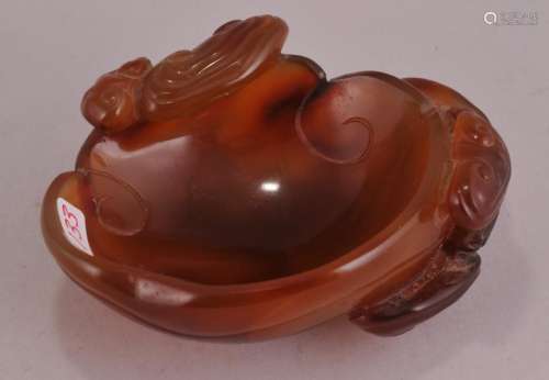 Carnelian water coupe. China. 18th/19th century. Surface carved with Ling Chih.  3-1/2 x 2-3/4