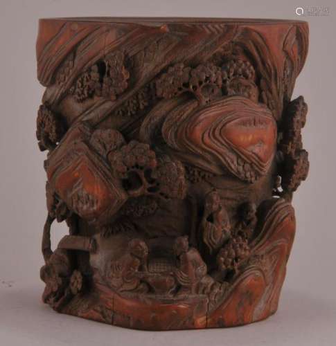 Bamboo brush pot. China. 19th century. Deeply carved with scholars in a mountain landscape.  5-5/8