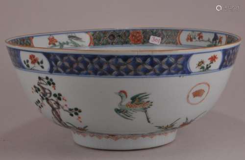 Porcelain bowl. Chinese Export ware. 18th century. Famille Verte decoration of birds and flowers with carved lotus decoration.  8-3/4