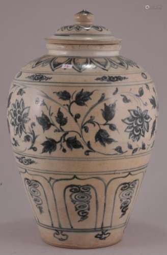 Porcelain covered jar. 16th century Anamese with underglaze blue scrolling decoration.  12-1/2
