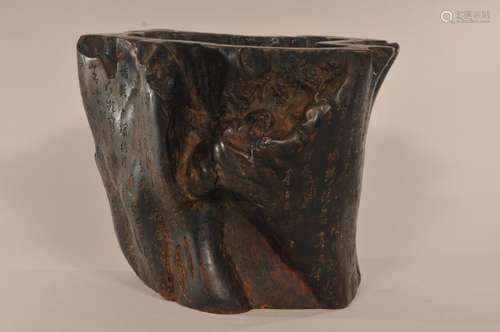 Large Agarwood brush pot. China. 19th century. Root wood carved with a landscape and long inscription.   8 1/2