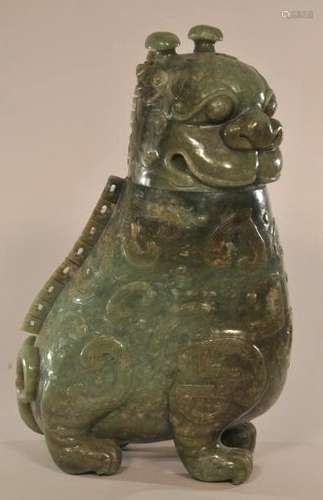 Ritual vessel. Archaic style. Tsun. China. 19th century. Stone of a forest green colour. Carved in the form of a mythical animal.  12-1/2