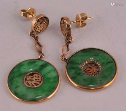 14 kt gold round green Jadeite drop earrings. Pierced backs. Gold Chinese script decoration. Round drop 3/4 diamond marked 14 kt.