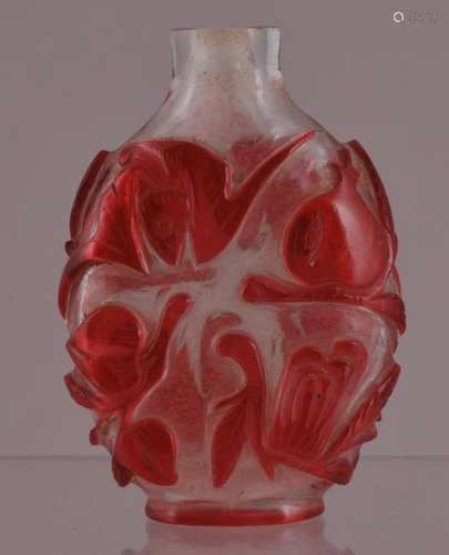 Peking glass snuff bottle. China. Circa 1900. Overlay type. Cameo cut red to clear with bats and peaches. 2-1/4