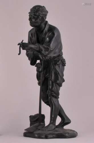 Bronze sculpture. Japan. Meiji period. (1868-1912) -Figure of a peasant smoking. 12