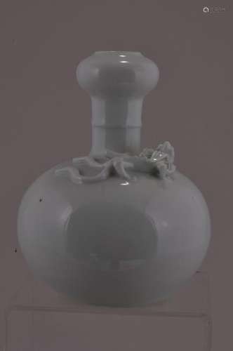 Porcelain vase. China. 20th century. Te Hua ware. Garlic mouth with a dragon at the shoulder.  5-3/4