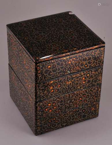 Lacquer box. Japan. Early 20th century. Four compartment type. Layered lacquered surface with mother of pearl. 9