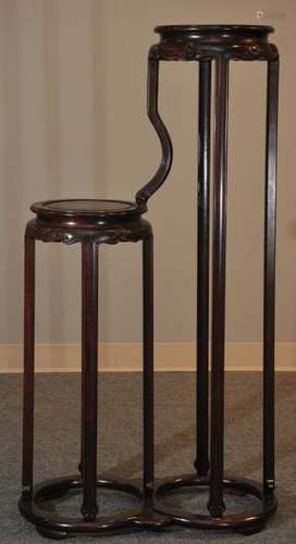 Double stand. China, Early 20th century. Rosewood carved with ju-i tops. 46-1/2