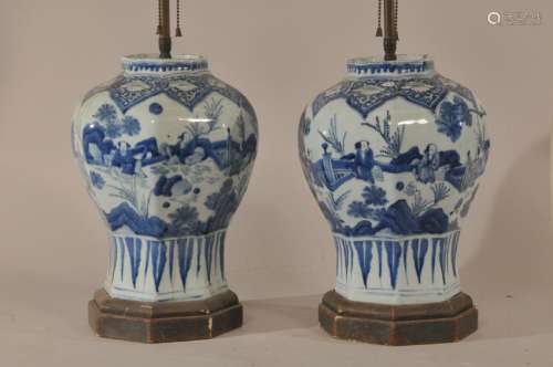 Pair of 18th century Japanese blue and white hexagonal shape porcelain vases. Landscape scenes with figures. Mounted as lamps. Vases- 12