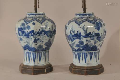 Pair of 18th century Japanese blue and white hexagonal shape porcelain vases. Landscape scenes with figures. Mounted as lamps. Vases- 12