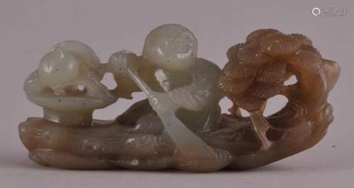 19th century Chinese brown and celadon jade carving of a figure on a leaf boat. Tree and Lingi decoration. 2-1/2