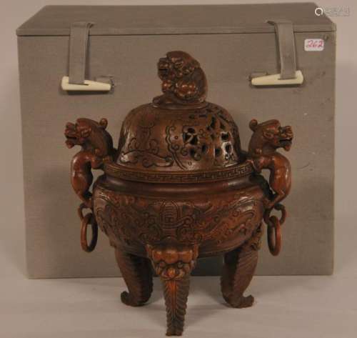 Carved bamboo censer. China. 19th/20th century. Foo dog jump rings and finials. Animal form and leaf shaped feet.  6 1/2