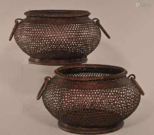 Pair of woven baskets. Japan. Early 20th century. Round ikebana with jump ring handles. 9-3/4 diameter.   6