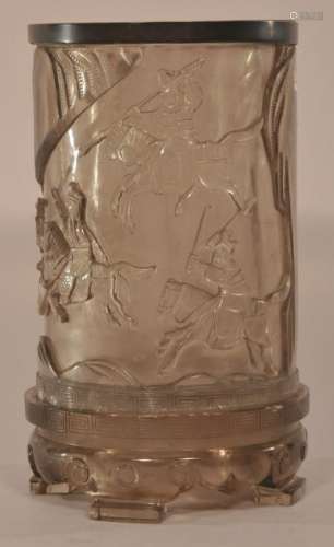 Rock crystal brush pot and stand. China. 19th century. Smoky quart carved with historical scenes. Cracks and losses.  8-1/2 overall height. 4-3/4