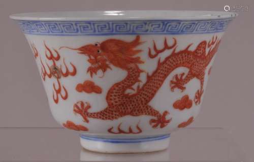 Porcelain cup. China. Kuang Hsu mark and possibly of the period. Decoration of iron red dragon and celestial pearls.   4