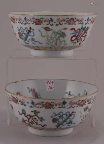 Pair of porcelain cups. China. 19th century. Famille Rose decoration of the emblems of the immortals and flowers and insects. Shen Te Tang mark on the base. 5