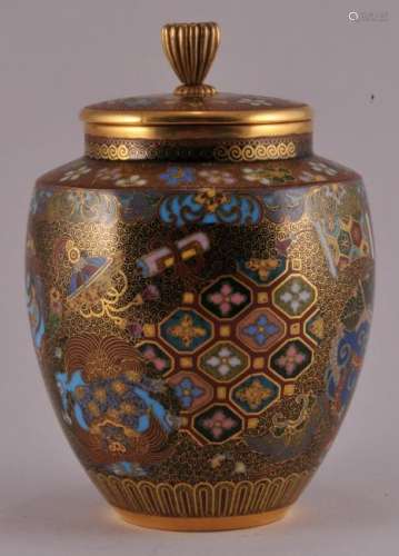 Fine quality Japanese gilt Cloisonne gold wire brocade decorated covered jar with Phoenix and floral decorated medallions. Gilt base and cover. 4