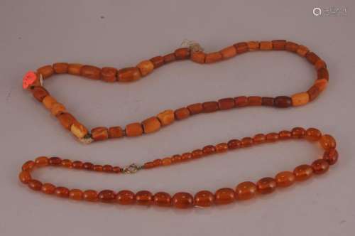 Two amber necklaces. Butter scotch colour. One with a mat finish, the other polished.  (1) 10-1/2