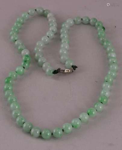 14 kt white gold Apple Green Jadeite bead necklace. Seventy approx. 6.5 - 7.1 mm translucent beads. 20-1/2