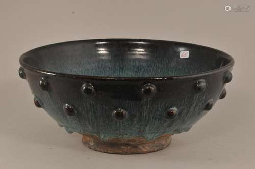 Stoneware bowl. South China. 19th century. Blue mottled glaze. Body decorated with hobnails.  9