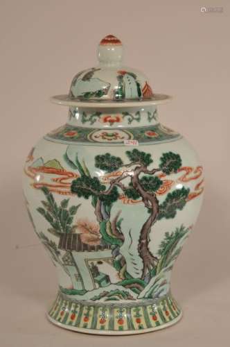 Porcelain covered jar. China. Late 19th century. Baluster form. Famille Verte decoration of immortals in a garden scene.   10