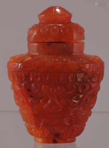 Carnelian snuff bottle. China. 19th century. Surface covered with archaic patterns. 1-3/4