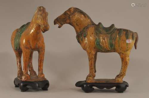 Pair of Pottery horses on stands. China. T'ang style but early 20th century. Fitted hardwood stands.  7-3/4