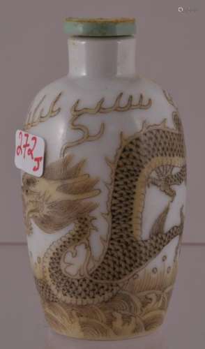 Porcelain snuff bottle. China. 19th century. Decoration of yellow dragons. 2-1/2