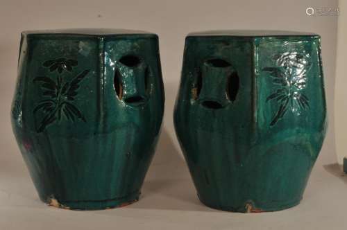 Pair of stoneware garden seats.  China. 20th century. Hexagonal form. Turquoise glaze with carved floral sprigs. 13-1/2