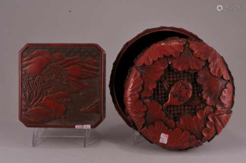 Two Japanese red lacquer covered boxes. (1) Round with relief carved floral and leaf decoration. 8