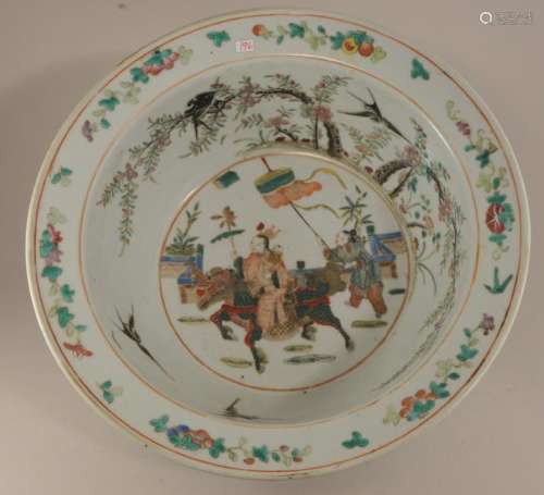 Porcelain basin. China. 19th century. Famille Rose decoration of an historical scene. 13-1/4