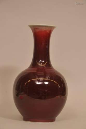 Porcelain vase. China. Kuang Tung six-character mark and possibly of the period. Lang Yao glaze of deep red fading to white at the mouth. 17