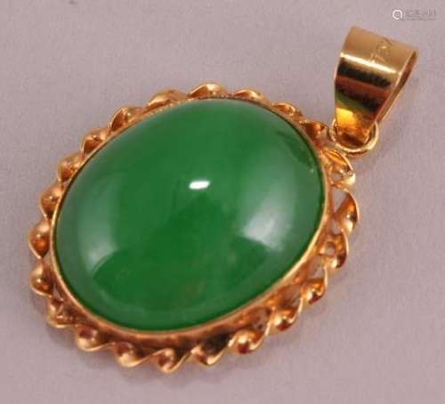 Jade cabochon pendant with 18 karat gold setting.  Jade untested. 1