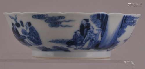 Porcelain bowl. China. 20th century. Underglaze blue decoration of a gathering of scholars. K'ang H si mark.  5-1/4