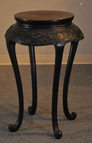 Incense stand. China. 19th century. Rosewood. Apron carved with lotus plants. 31-1/2