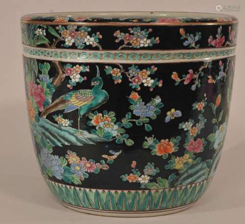 Porcelain planter. Japan. Early 20th century. Famille Rose decoration of phoenixes and flowers.  9-1/2