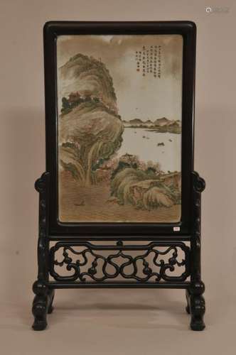 Early Republic period Chinese porcelain plaque on carved wood stand. Mountain and river landscape decoration. Inscription with a seal. Overall size: 24