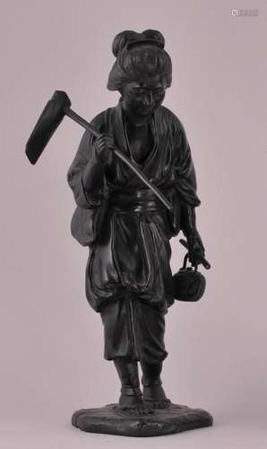 Bronze sculpture. Japan. Meiji period. (1868-1912). Tokyo School Peasant women with a teapot holding a hoe.   12