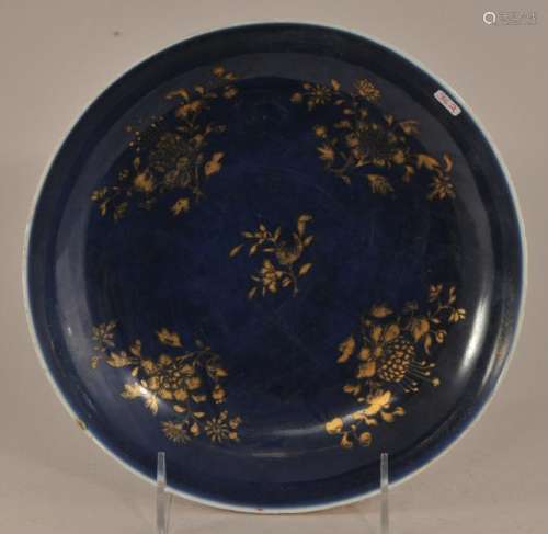 Porcelain bowl. China. 19th century.  Blue interior with gilt floral detail. 8