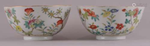 Pair of 19th century Chinese porcelain Famille Rose floral decorated bowls with scalloped top. Peach and bat interior decoration. Daoguang marks and possibly of the period. One with hairline crack. 4-1/4