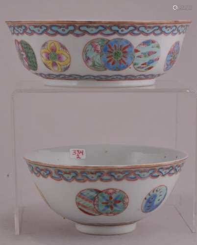 Lot of two porcelain bowls. China. Early 20th century. Famille Rose decoration of brocade spheres, ju-I borders. Company mark on the vase. [1] 4-1/2 diameter. 2