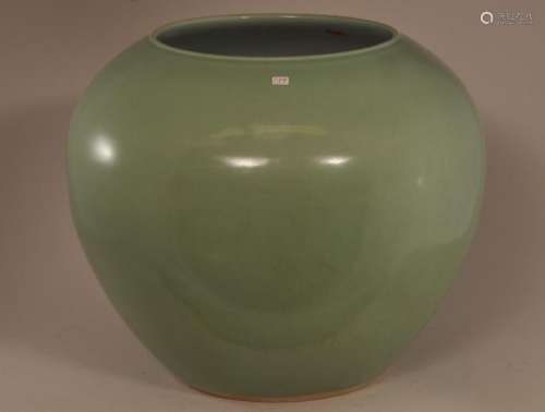 Large vase. China. Early 20th century. Begging bowl form. Sea green Celadon glaze.   12