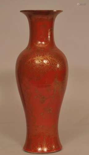 19th century coral ground Chinese porcelain vase with gilt decoration. Drilled for lamp. Hole filled with plaster. Rim flakes. 14