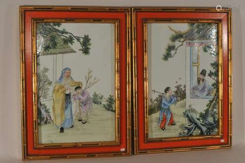 Pair of framed porcelain plaques. China. Republic period, circa 1930. Famille rose decoration scenes of filial piety. Sight 15 x 10