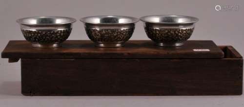 Three silver Wine cups. China. Early 20th century. Cast floral decoration. Signed Each bowl - 1-7/8