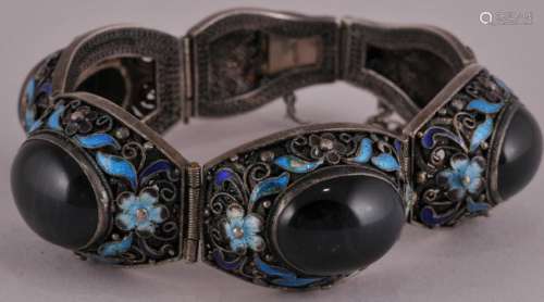 Late 19th century Chinese Enameled filigree silver bracelet mounted with four stone cabuchon. Enamel floral decoration. Marked silver on clasp.