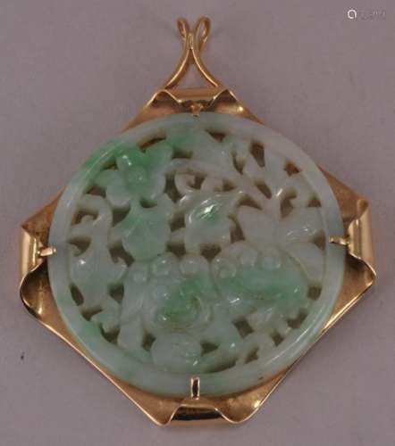 14 kt Gold Apple Green Jadeite pierced carved large pendant. Marked 14 kt. Marked 