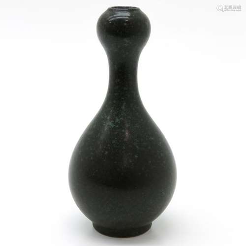 A Green Speckled Decor Vase Marked on bottom with ...